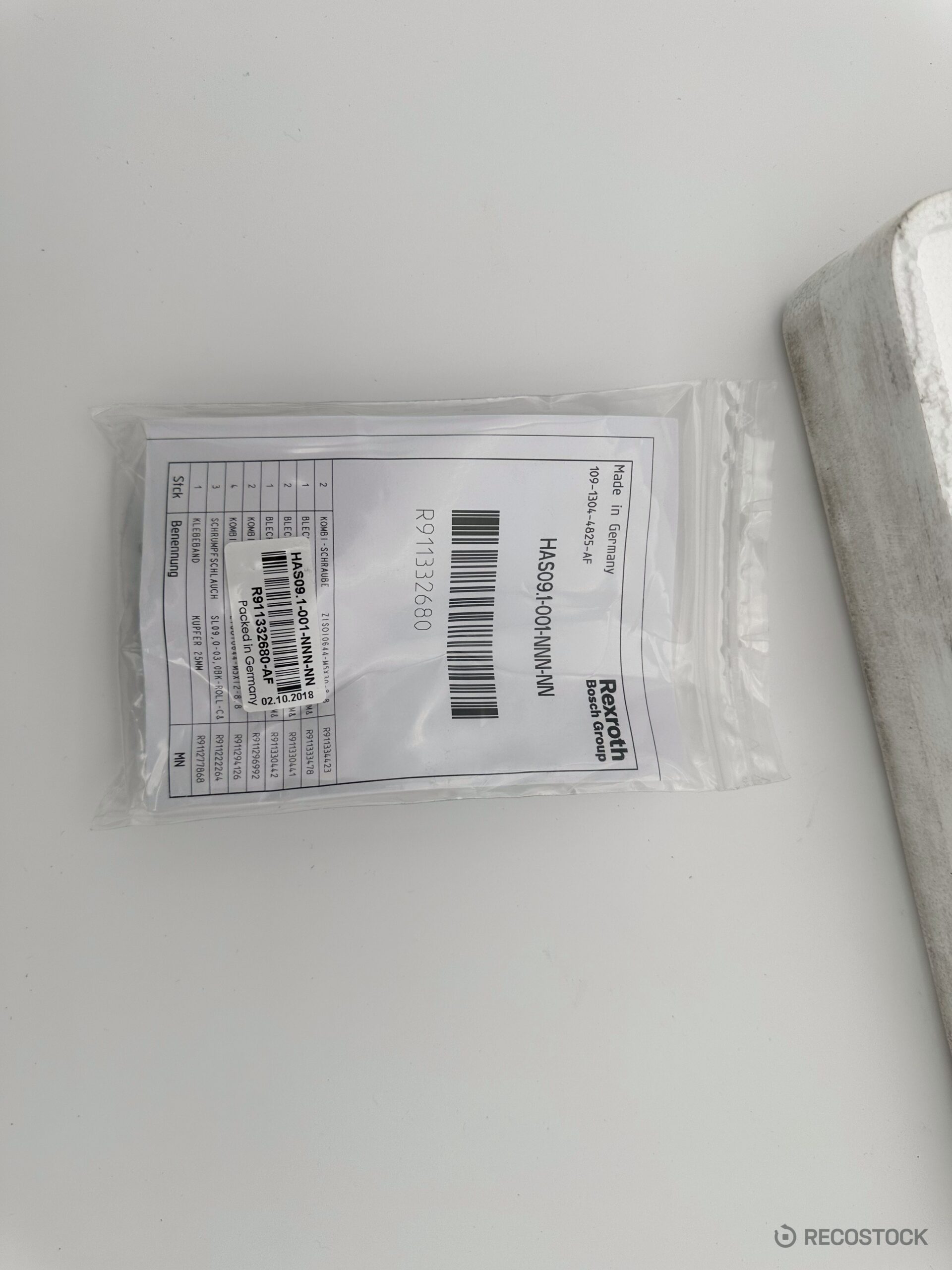 serwonapęd Bosch Rexroth HCS01.1E-W0028-A-03 — widok tabliczki i złączy — zdjecie 3